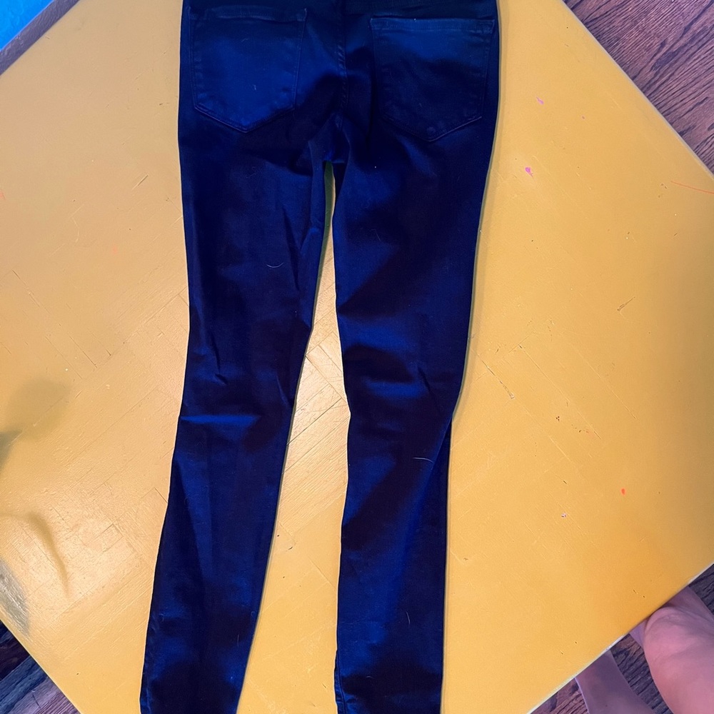 Frame ripped black jeans
